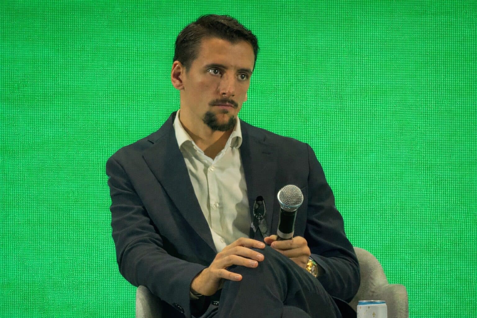 Riccardo Longato speaking at an industry event
